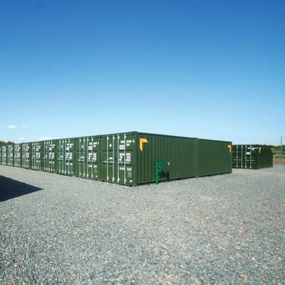 Green self storage units at Clear storage Hereford on a nice sunny day